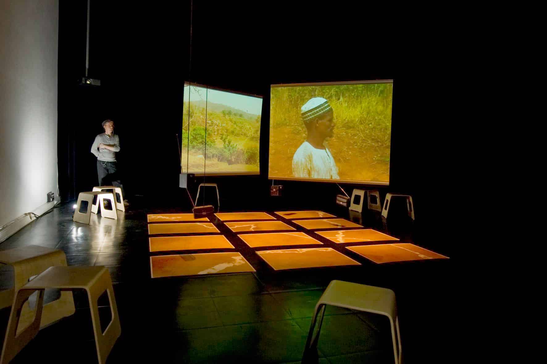 NomadicMILK art installation with video and sandprints of GPS tracks of Fulani herdsmen in Nigeria in Zaal 5 The Hague